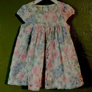 Lacey multi-colored dress for a toddler